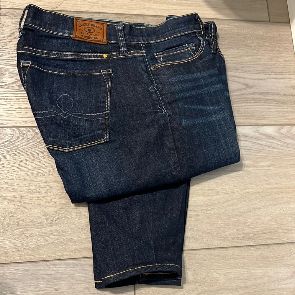 Jeans - Never Worn/slightly distressed in front/no holes
